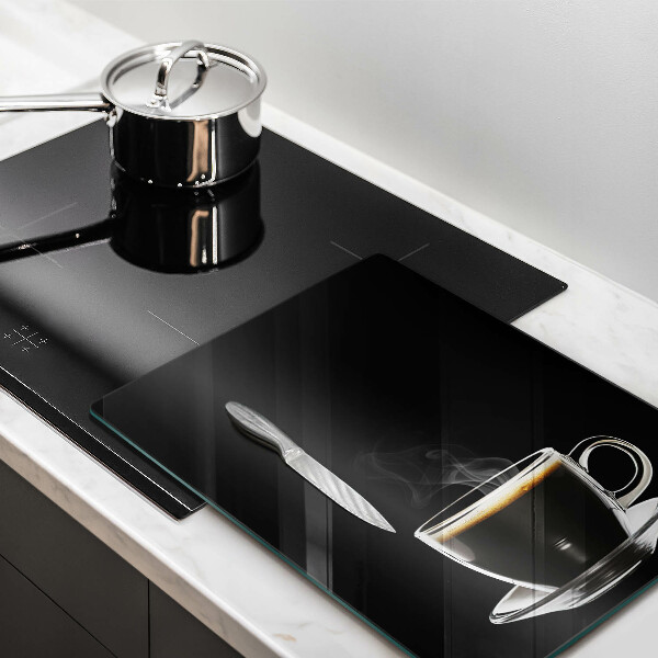 Tagliere in vetro Un bicchiere di caffè caldo