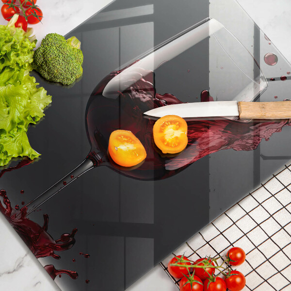 Tagliere in vetro Vino rosso in un bicchiere