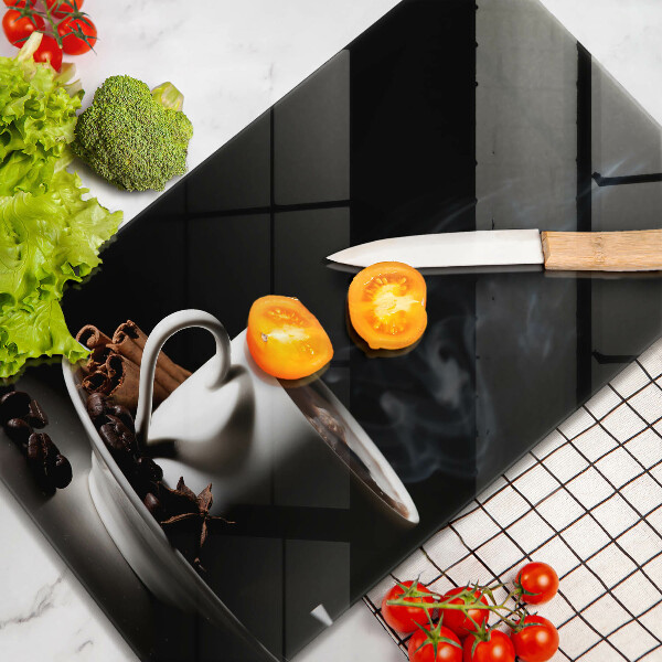 Tagliere in vetro Una tazza di caffè caldo