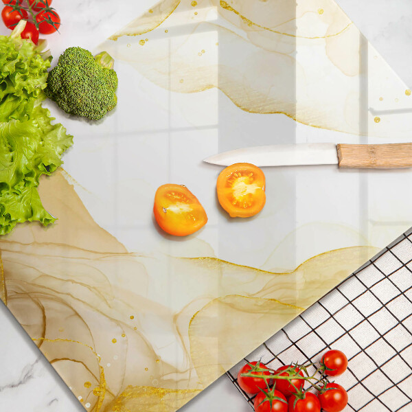 Tagliere in vetro Astrazione dorata