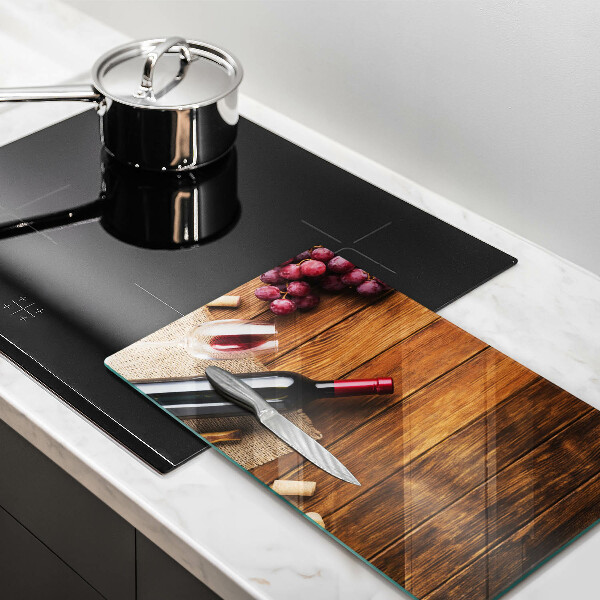 Tagliere in vetro Una bottiglia di vino rosso