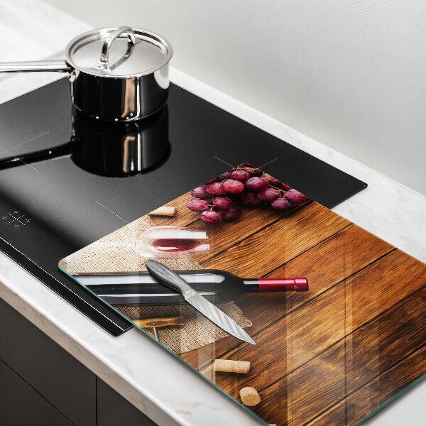 Tagliere in vetro Una bottiglia di vino rosso