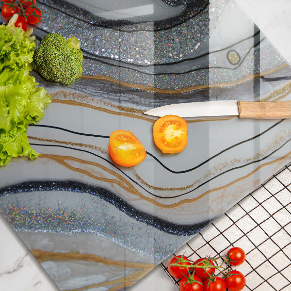 Tagliere in vetro roccia con oro