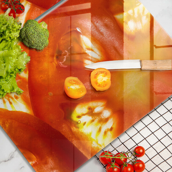 Copri piano cottura Una fetta di pomodoro rosso