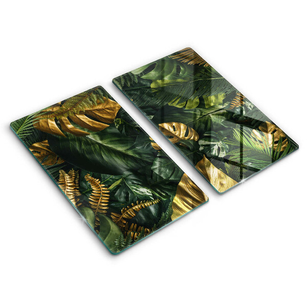 Copri piano cottura in vetro Foglie dorate di monstera