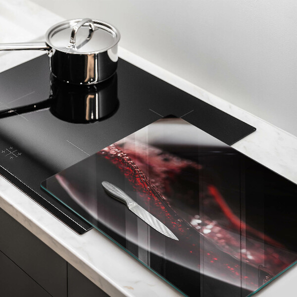 Copri piano induzione Vino rosso in un bicchiere