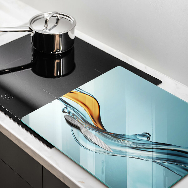 Copertura piano induzione Acqua su sfondo blu