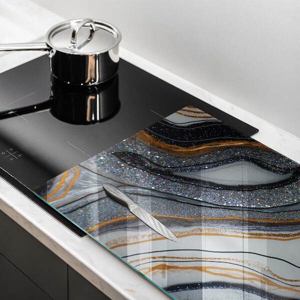 Protezione piano induzione roccia con oro