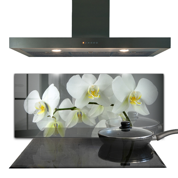 Rivestimento parete cucina Orchidea bianca su sfondo nero