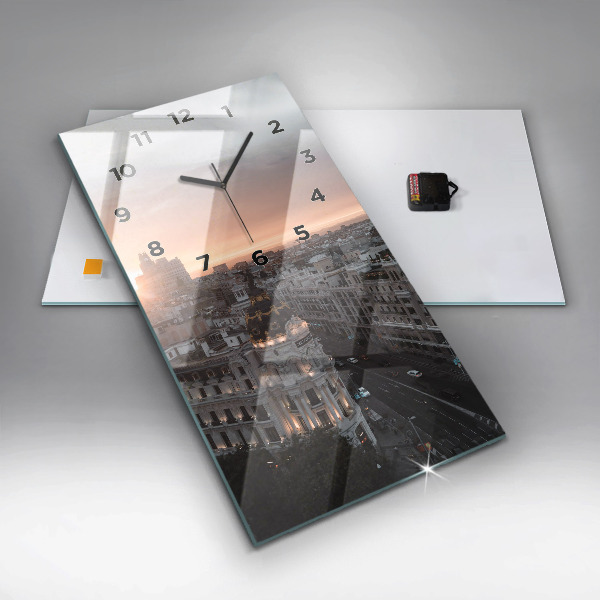 Orologio verticale in vetro Città al tramonto