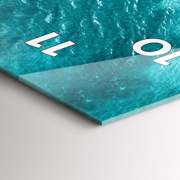 Orologio verticale gente spiaggia mare