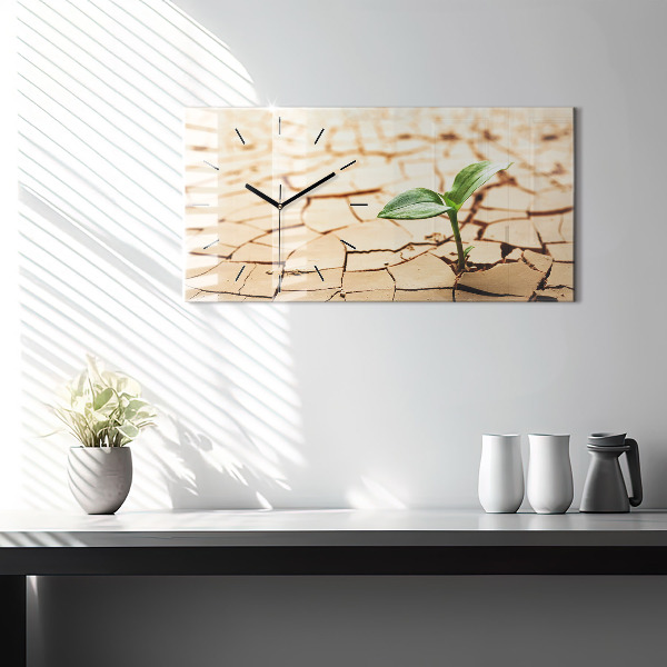 Orologio rettangolare Una pianta in terreno secco