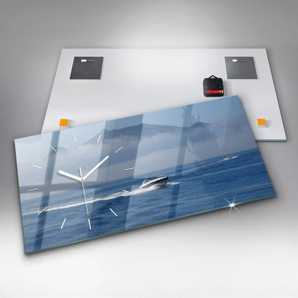 Orologi orizzontali Una barca che galleggia sull'oceano