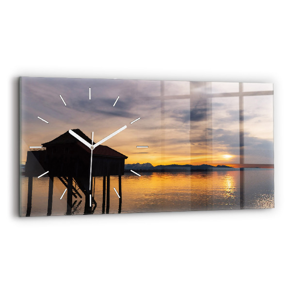 Orologi orizzontali Tramonto sul lago