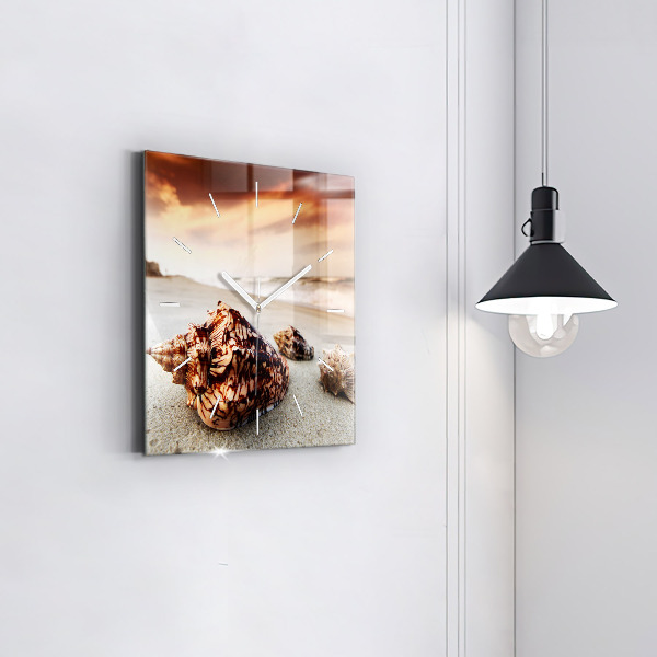 Orologio quadrato Una conchiglia sulla spiaggia