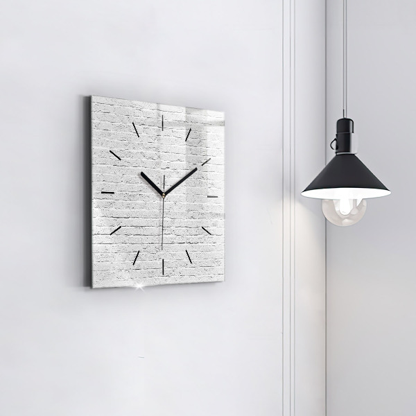 Orologio quadrato Un muro di mattoni leggeri