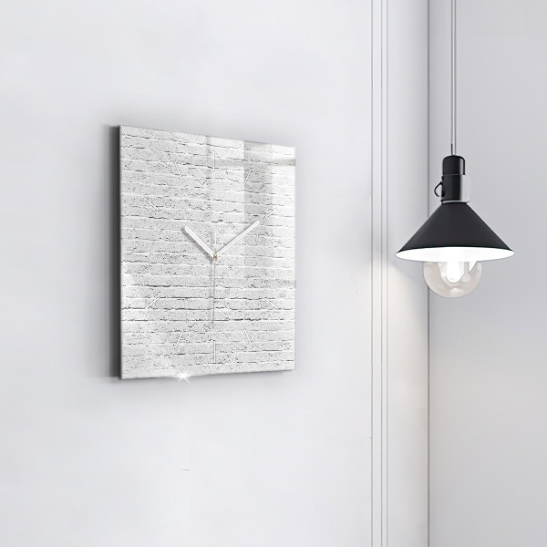Orologio quadrato Un muro di mattoni leggeri