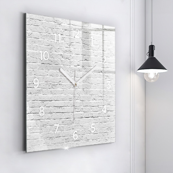 Orologio quadrato Un muro di mattoni leggeri