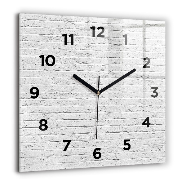 Orologio quadrato Un muro di mattoni leggeri