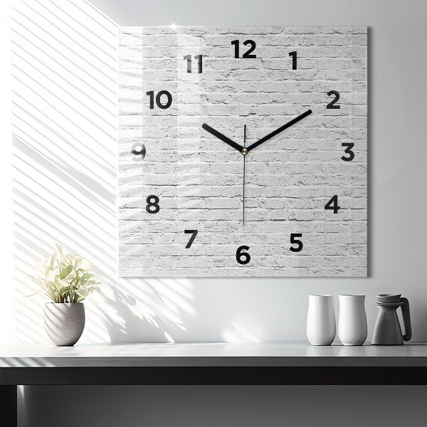 Orologio quadrato Un muro di mattoni leggeri