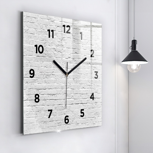 Orologio quadrato Un muro di mattoni leggeri