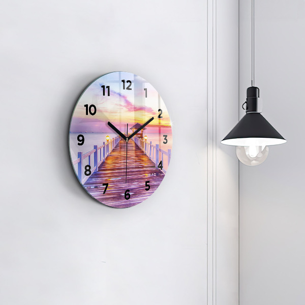 Orologio rotondo Il ponte del porto di sera
