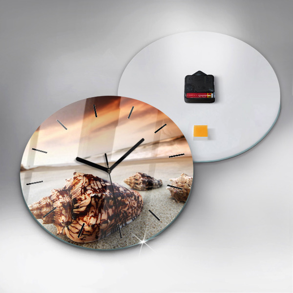 Orologio rotondo Una conchiglia sulla spiaggia