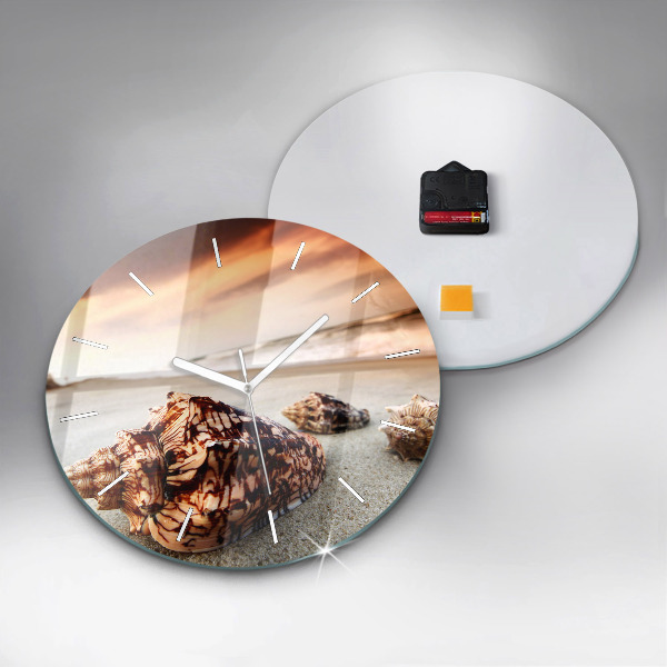 Orologio rotondo Una conchiglia sulla spiaggia