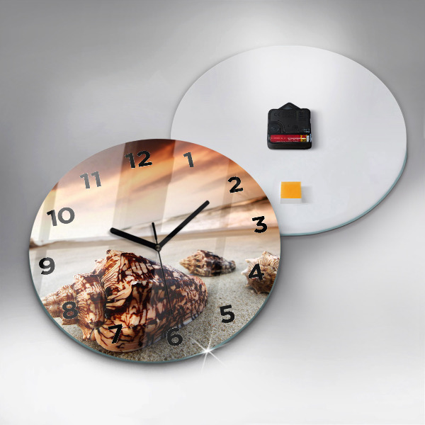 Orologio rotondo Una conchiglia sulla spiaggia