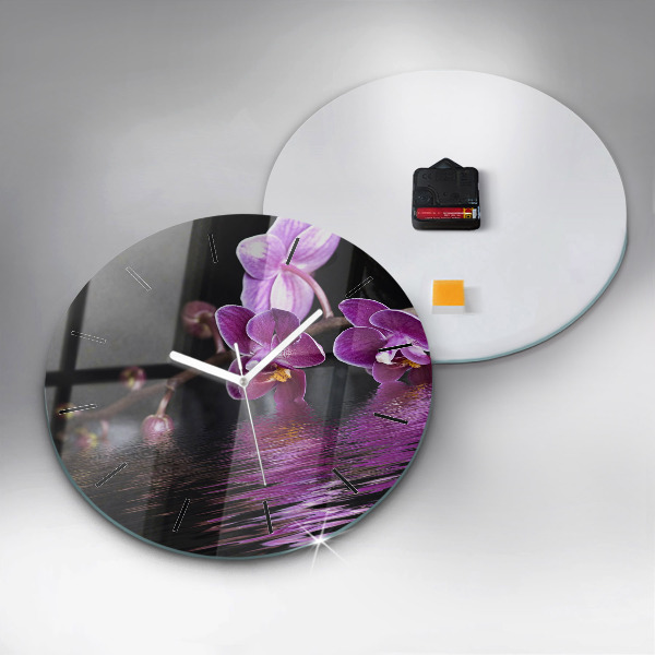 Orologio rotondo Fiore di orchidea sull'acqua