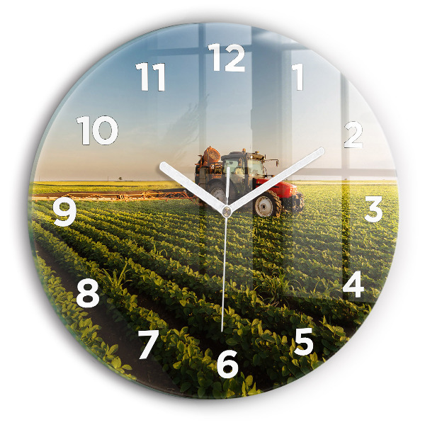Orologio rotondo in vetro Trattore in un campo agricolo