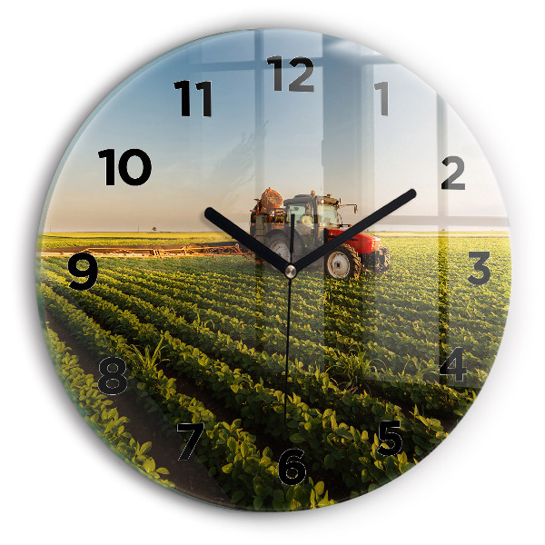 Orologio rotondo in vetro Trattore in un campo agricolo