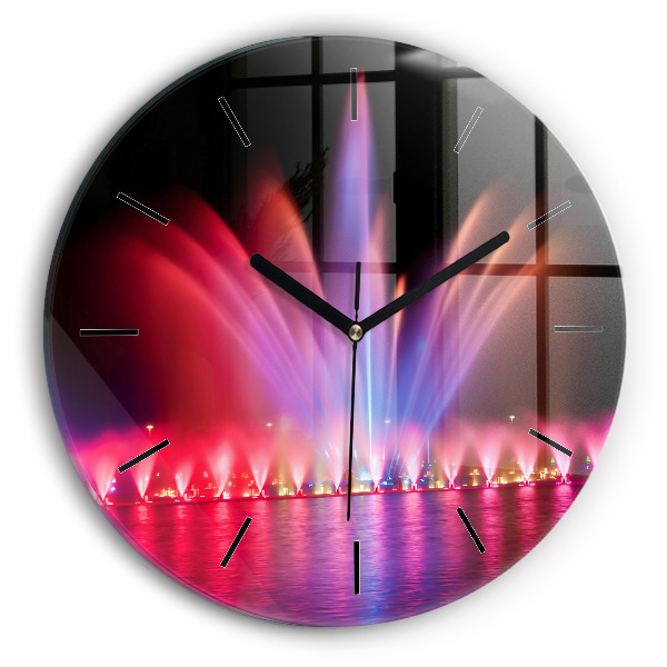 Orologio rotondo Fontana di Wroclaw di notte