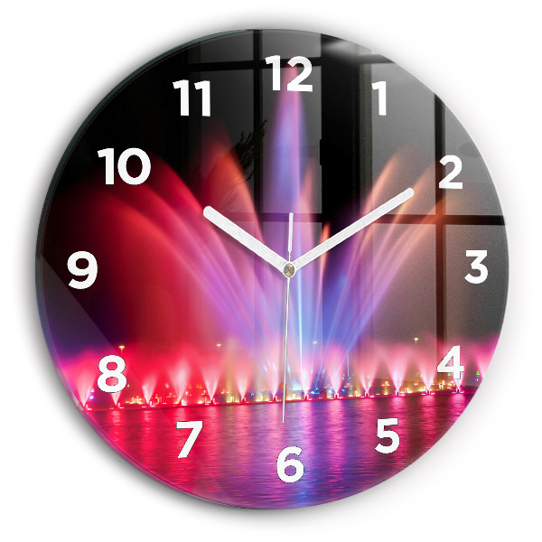 Orologio rotondo Fontana di Wroclaw di notte