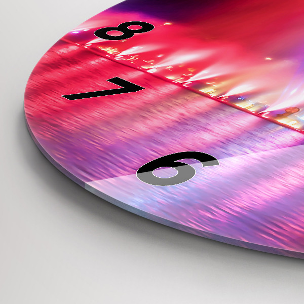 Orologio rotondo Fontana di Wroclaw di notte