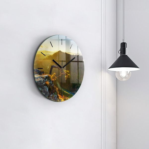 Orologio rotondo Tramonto sulle montagne