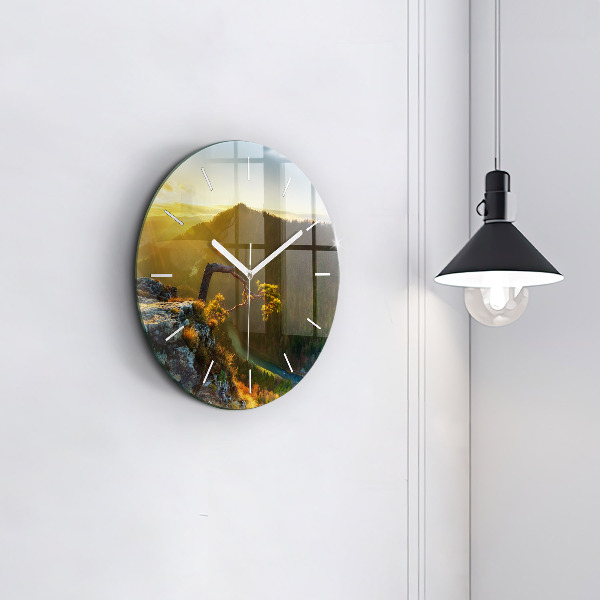 Orologio rotondo Tramonto sulle montagne