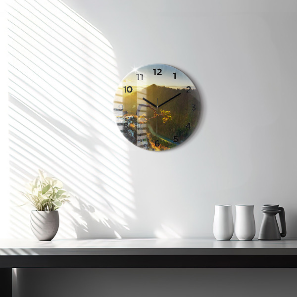 Orologio rotondo Tramonto sulle montagne