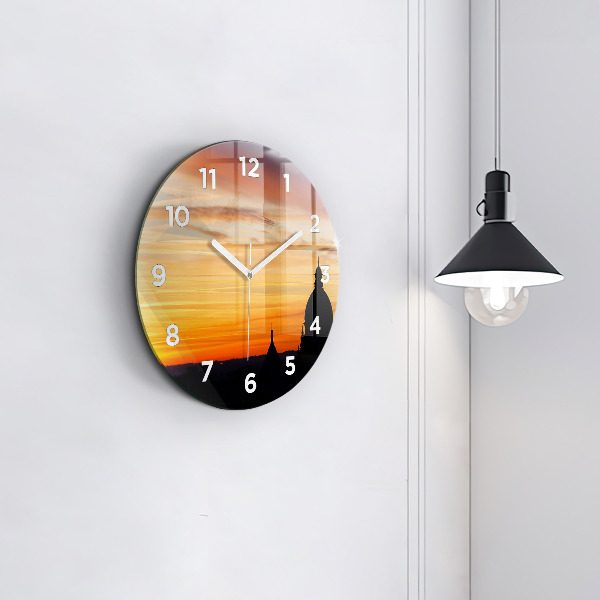 Orologio rotondo in vetro Edificio e tramonto