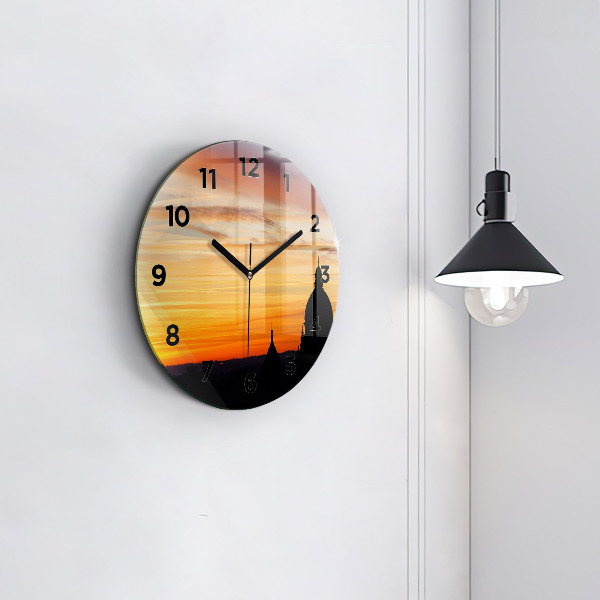Orologio rotondo in vetro Edificio e tramonto