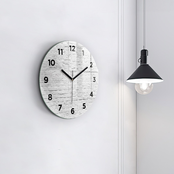 Orologio rotondo Un muro di mattoni leggeri